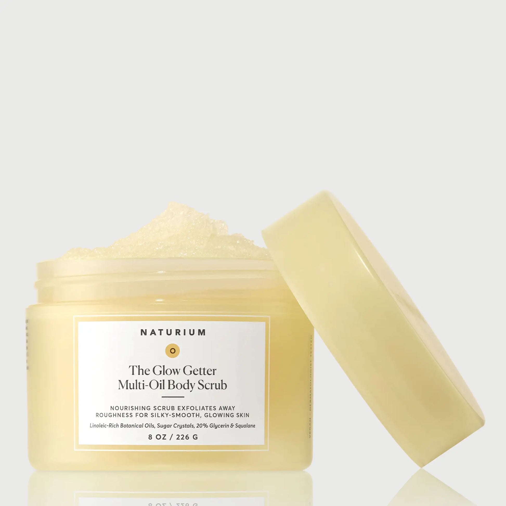 the-glow-getter-multi-oil-body-scrub-r5 NATR-40028-GlowGetter-Multi-Oil-Body-Scrub-Front-CapOff-bonebkgd.webp